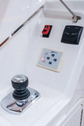  Yacht Photos Pics Control panel of a 2015 Belize 54 Daybridge yacht with joystick and buttons.