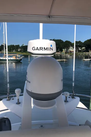  Yacht Photos Pics 2015 Belize 54 Daybridge yacht with Garmin radar on a serene waterfront.