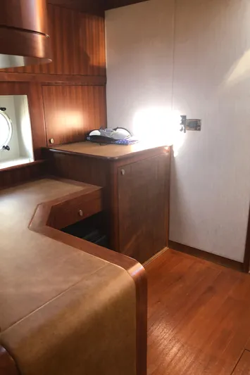  Yacht Photos Pics Luxurious interior of 2015 Belize 54 Daybridge yacht with wood finishes and natural light.