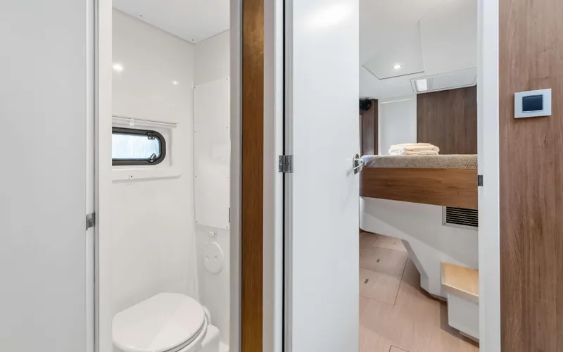 Always Sunday Yacht Photos Pics Interior of 2022 Bali 4.8 yacht showing bathroom and bedroom area.