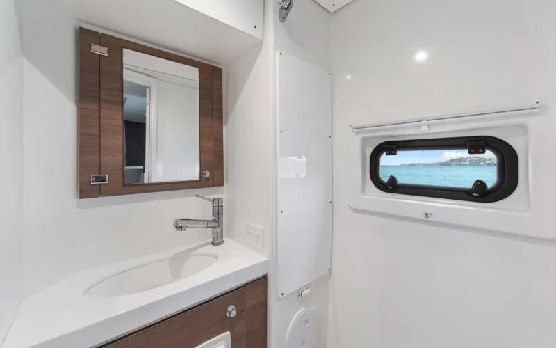 Always Sunday Yacht Photos Pics Modern bathroom interior on 2022 Bali 4.8 yacht with ocean view window.