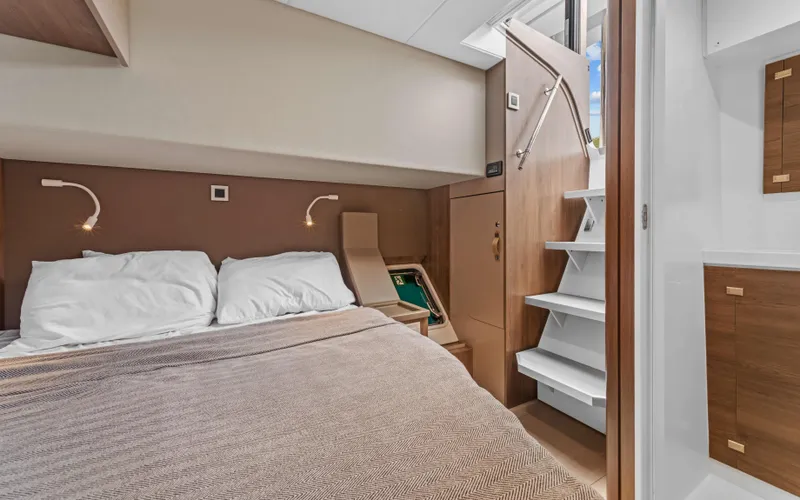 Always Sunday Yacht Photos Pics Luxurious cabin interior of 2022 Bali 4.8 yacht with cozy bed and modern design.