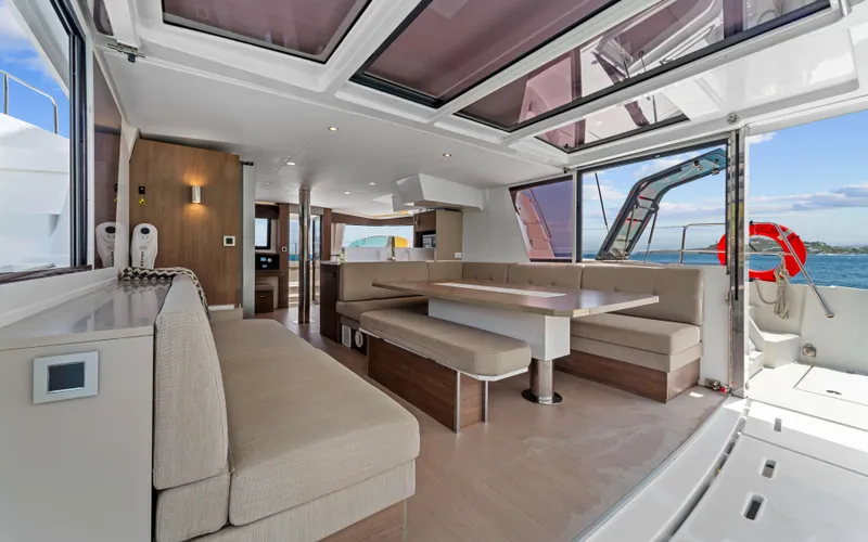Always Sunday Yacht Photos Pics Luxurious interior of 2022 Bali 4.8 yacht with spacious seating and ocean view.