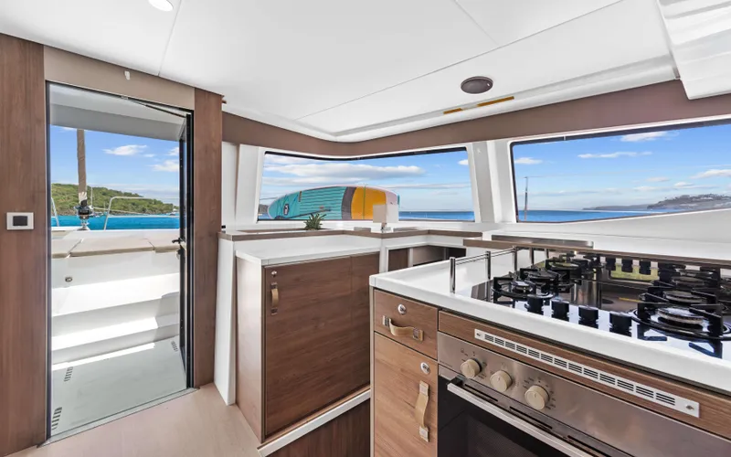 Always Sunday Yacht Photos Pics Modern kitchen interior on 2022 Bali 4.8 yacht with ocean view.