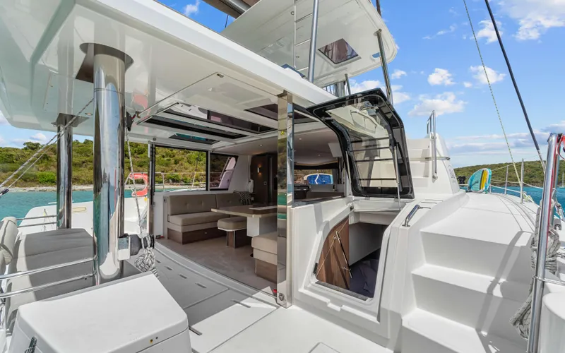 Always Sunday Yacht Photos Pics Luxurious 2022 Bali 4.8 catamaran interior with open seating and scenic ocean view.