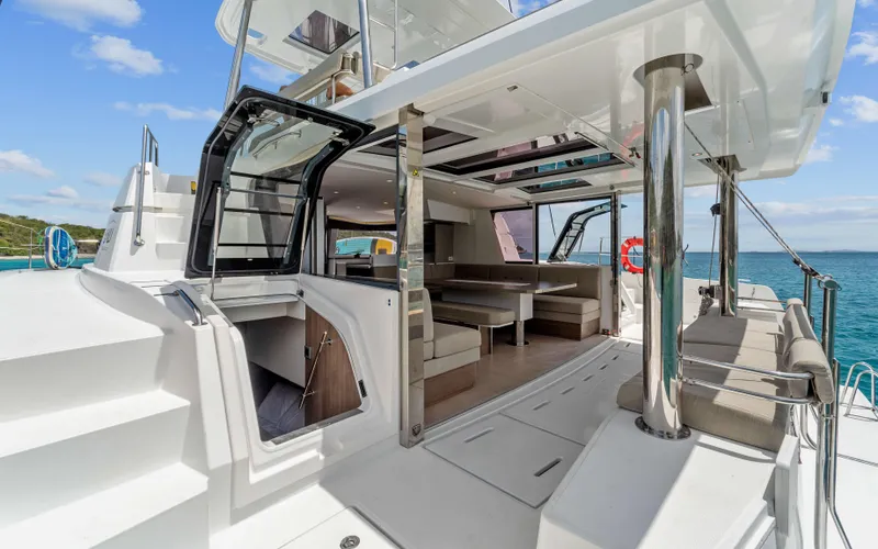 Always Sunday Yacht Photos Pics Luxurious 2022 Bali 4.8 yacht interior with open seating and ocean view.