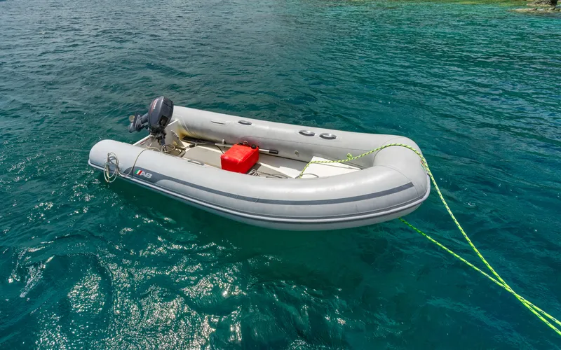 Always Sunday Yacht Photos Pics Inflatable boat Bali 4.8, 2022 model, floating on clear blue water.