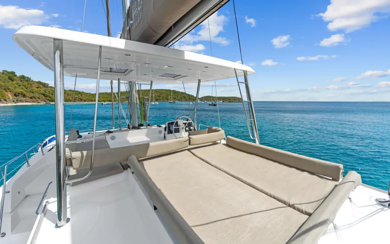 Always Sunday Yacht Photos Pics 2022 Bali 4.8 yacht with sunbathing area, sailing in clear blue waters.