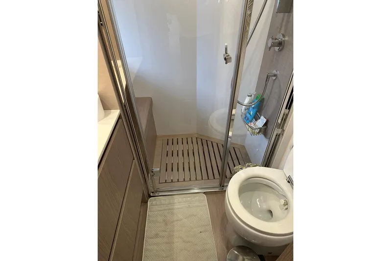  Yacht Photos Pics Bathroom interior of 2021 Azimut Fly 72 yacht with shower and toilet.