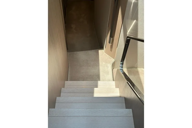  Yacht Photos Pics Staircase inside 2021 Azimut Fly 72 yacht, featuring sleek modern design.