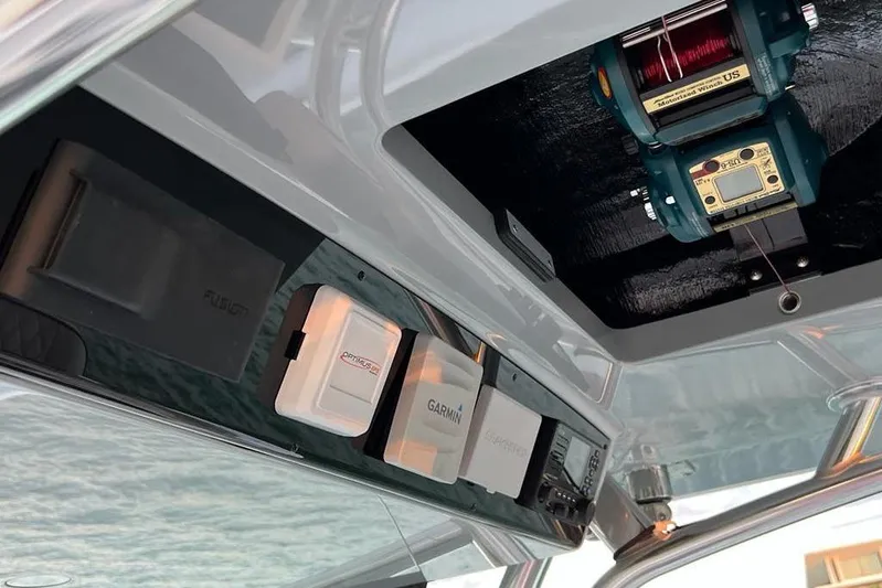  Yacht Photos Pics 2023 Valhalla Boatworks V-37 electronics panel with Garmin and Fusion systems.