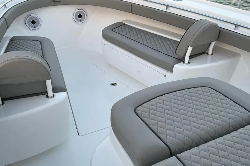  Yacht Photos Pics 2023 Valhalla Boatworks V-37 interior with gray quilted seating and sleek design.