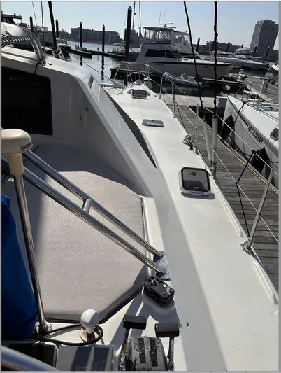 Blue Star Yacht Photos Pics Sailboat docked at marina, Privilege 43 model, 1993, with visible deck and equipment.
