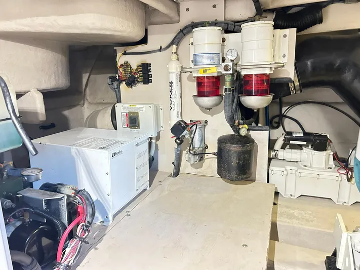 Rock It Yacht Photos Pics Engine room of 2007 Sea Ray 52 Sundancer with mechanical components and wiring.