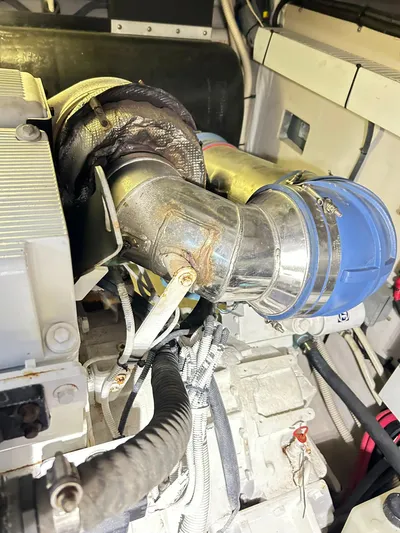 Rock It Yacht Photos Pics Engine compartment of a 2007 Sea Ray 52 Sundancer yacht, showcasing mechanical components.