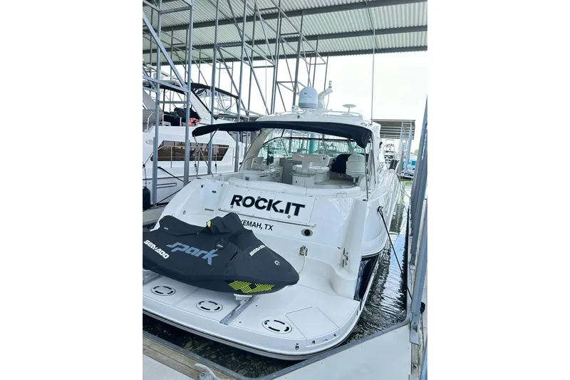 Rock It Yacht Photos Pics 2007 Sea Ray 52 Sundancer docked with Sea-Doo Spark jet ski.