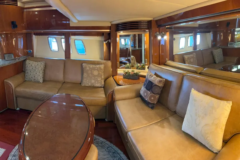 Rock It Yacht Photos Pics Luxurious interior of 2007 Sea Ray 52 Sundancer yacht with leather seating and elegant decor.
