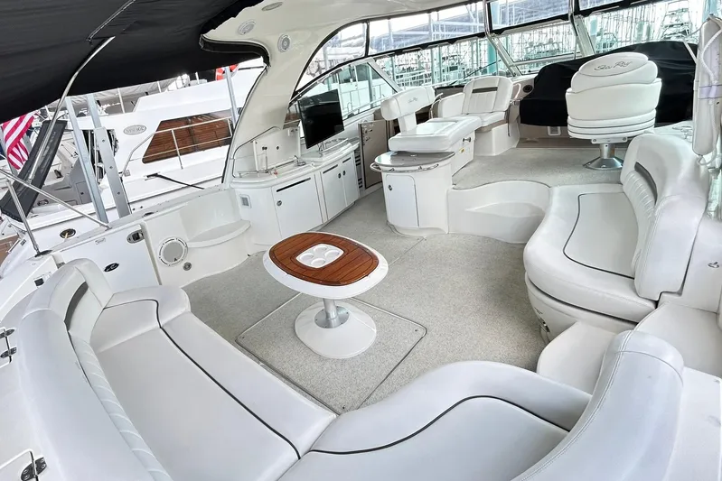 Rock It Yacht Photos Pics Luxurious 2007 Sea Ray 52 Sundancer yacht interior with plush seating and elegant design.