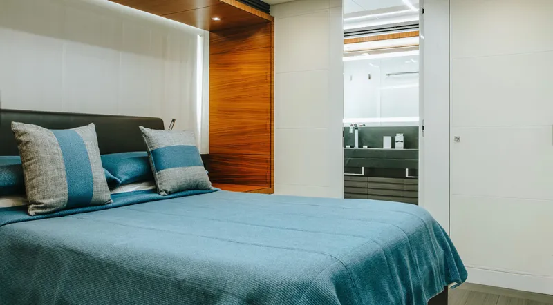  Yacht Photos Pics Luxurious bedroom interior on 2017 Astondoa 100 Century yacht, featuring modern design and elegant decor.