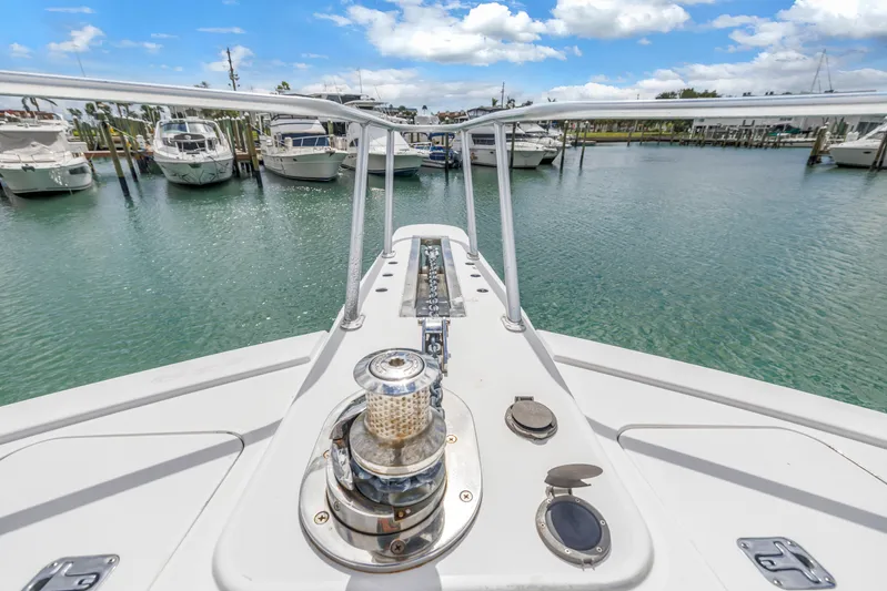 Reel Blonde Yacht Photos Pics Bow view of 1999 Viking 72 Enclosed Bridge yacht docked in marina.