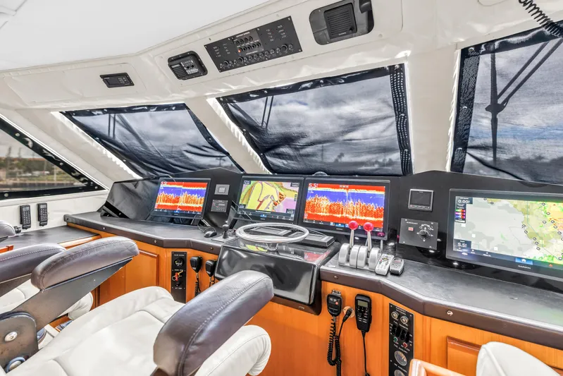 Reel Blonde Yacht Photos Pics Control room of a 1999 Viking 72 Enclosed Bridge yacht with advanced navigation systems.
