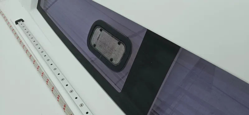 Diamant Noir Yacht Photos Pics Beneteau Oceanis 46 (2011) window detail with sleek design and modern finish.