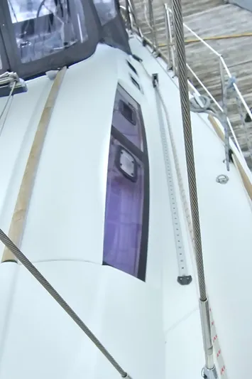 Diamant Noir Yacht Photos Pics 2011 Beneteau Oceanis 46 sailboat deck with sleek design and modern fittings.