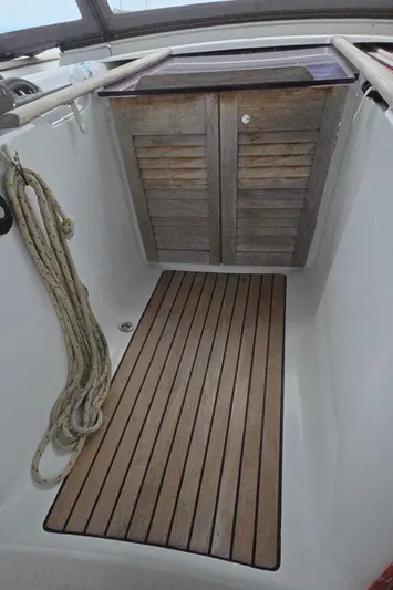 Diamant Noir Yacht Photos Pics Beneteau Oceanis 46 cockpit with wooden flooring and storage, 2011 model.