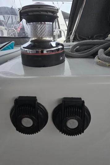 Diamant Noir Yacht Photos Pics Winch and cleats on 2011 Beneteau Oceanis 46 sailboat deck.