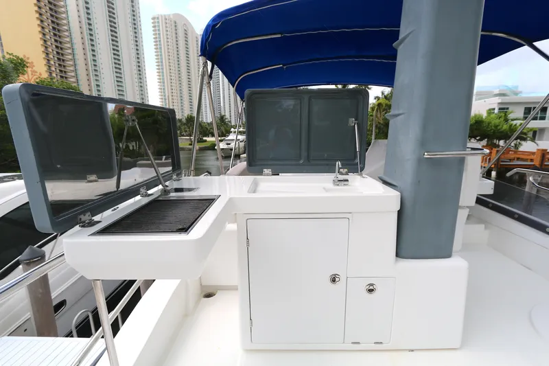  Yacht Photos Pics Outdoor kitchen on 2014 Azimut Magellano 43 yacht with grill and sink.