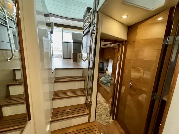 Salacia Yacht Photos Pics 2018 Cruisers 45 Cantius yacht interior with wooden stairs and modern design.