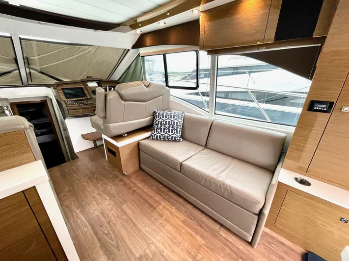 Salacia Yacht Photos Pics Luxurious interior of 2018 Cruisers 45 Cantius yacht with leather seating and modern design.