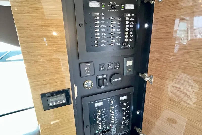 Salacia Yacht Photos Pics Control panel of 2018 Cruisers Yachts 45 Cantius, featuring switches and indicators.