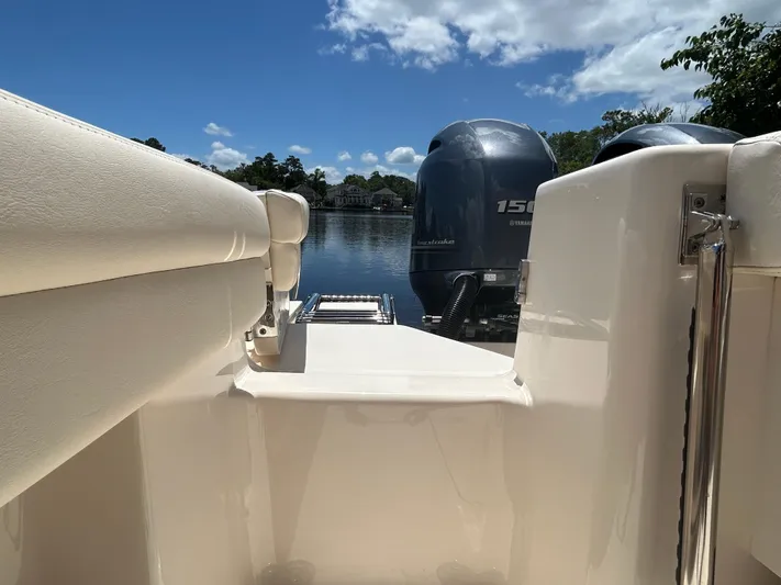  Yacht Photos Pics 2022 Grady-White 255 FREEDOM boat with dual outboard motors on a sunny day.