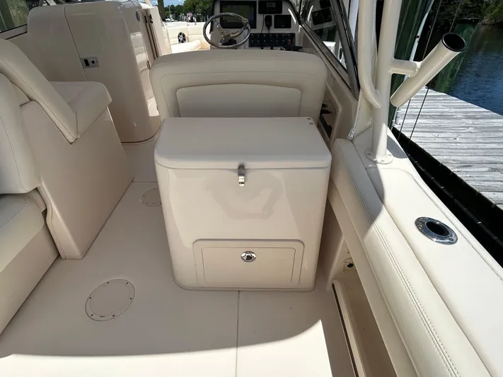  Yacht Photos Pics 2022 Grady-White 255 FREEDOM boat interior with seating and storage compartments.