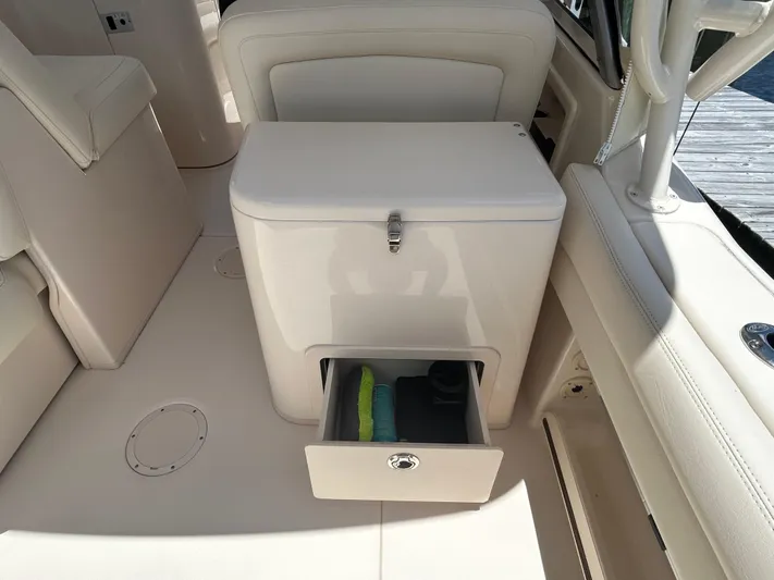 Yacht Photos Pics 2022 Grady-White 255 FREEDOM boat interior with storage compartment open.