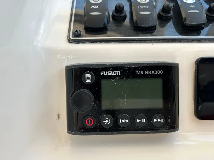  Yacht Photos Pics Fusion MS-NRX300 marine stereo on 2022 Grady-White 255 FREEDOM boat dashboard.