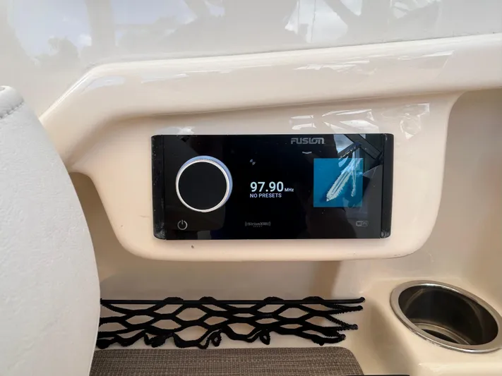  Yacht Photos Pics Fusion stereo system on 2022 Grady-White 255 FREEDOM boat dashboard.