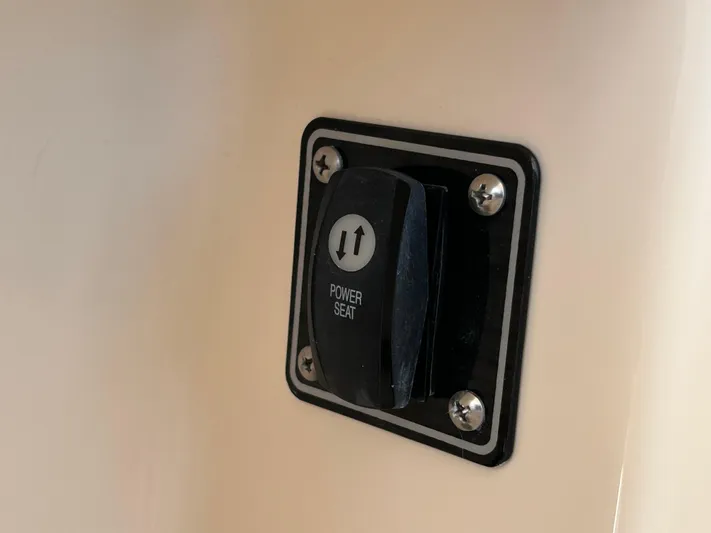  Yacht Photos Pics Power seat switch on 2022 Grady-White 255 FREEDOM boat.