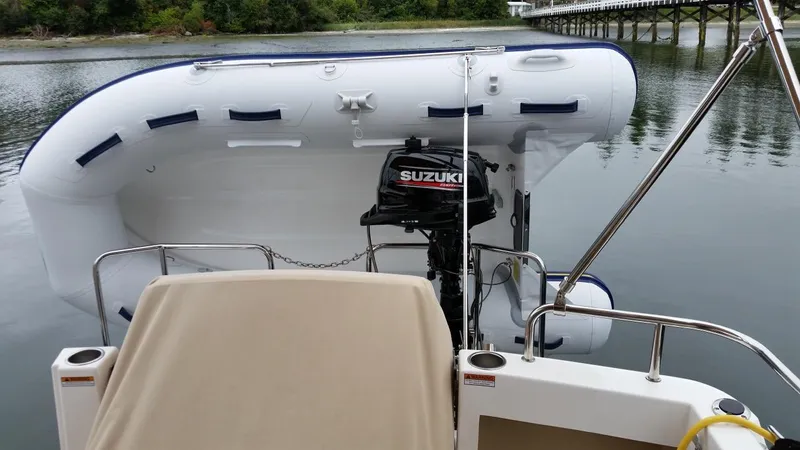 Lady K Yacht Photos Pics 2017 Cutwater C-28 with Suzuki outboard motor and dinghy.