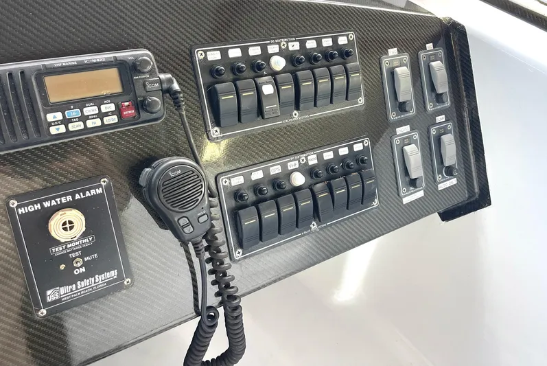  Yacht Photos Pics Control panel of a 2008 Goetz Custom Boats 33' Limo Tender with radio and switches.