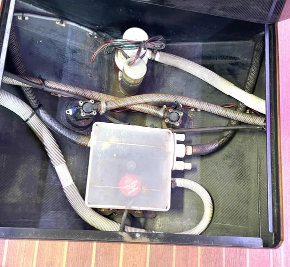  Yacht Photos Pics Engine compartment of a 2008 Goetz Custom Boats 33' Limo Tender, showing hoses and wiring.