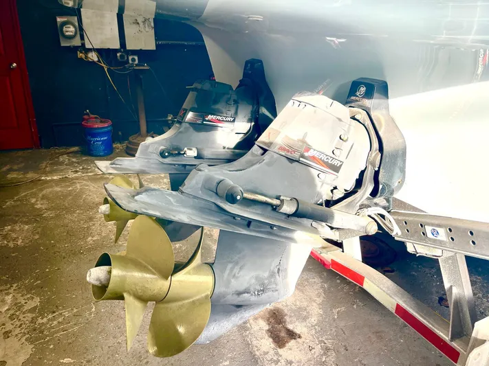  Yacht Photos Pics Propellers and Mercury engines of a 2008 Goetz Custom Boats 33' Limo Tender in a workshop.