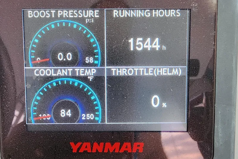 Miss Saigon Yacht Photos Pics Yanmar engine display on 2019 Leopard 51 Powercat showing boost pressure, running hours, coolant temp, and throttle.