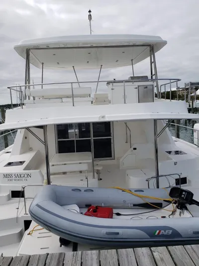 Miss Saigon Yacht Photos Pics 2019 Leopard 51 Powercat yacht docked with inflatable boat.