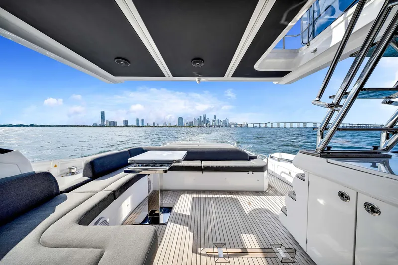 Amf Yacht Photos Pics Luxurious 2021 Azimut S6 yacht interior with city skyline and ocean view.