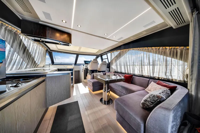 Amf Yacht Photos Pics Luxurious interior of 2021 Azimut S6 yacht with modern furnishings and panoramic windows.