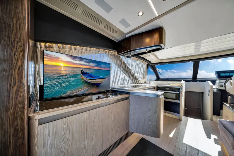 Amf Yacht Photos Pics Luxurious interior of 2021 Azimut S6 yacht with modern kitchen and scenic view.