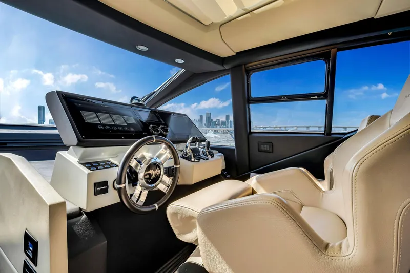 Amf Yacht Photos Pics Luxurious 2021 Azimut S6 yacht cockpit with modern steering and city skyline view.