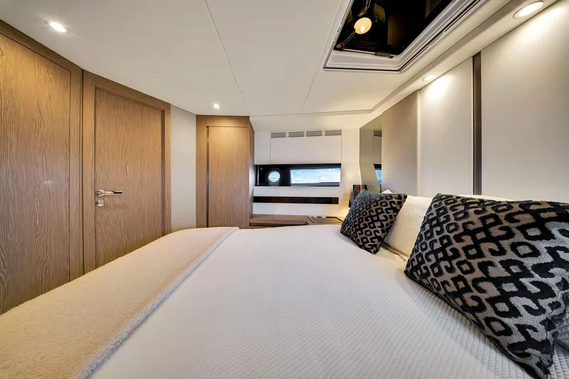 Amf Yacht Photos Pics Luxurious bedroom interior of 2021 Azimut S6 yacht with modern design and elegant decor.